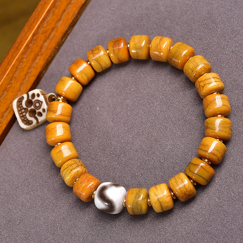 EverestArtstudios Bone Barrel Bead Color Accent Bracelet
