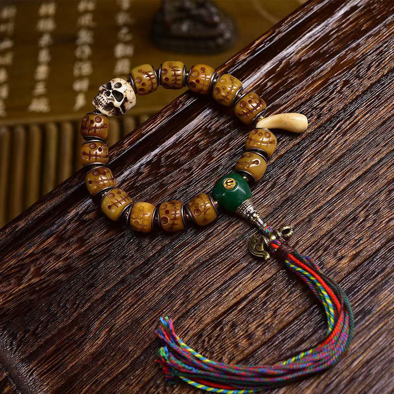 EverestArtstudios Camel Bone Carved Skull Motif Tassel Bracelet