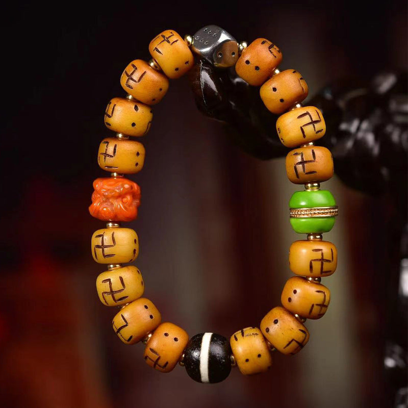 EverestArtstudios Bone Auspicious Symbol Barrel Bead Bracelet