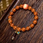 EverestArtstudios Monkey Head Bodhi Seed Banded Agate Bracelet