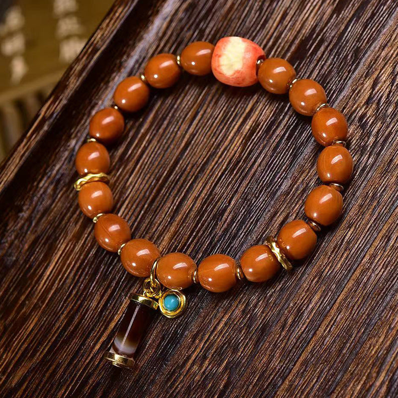 EverestArtstudios Monkey Head Bodhi Seed Banded Agate Bracelet