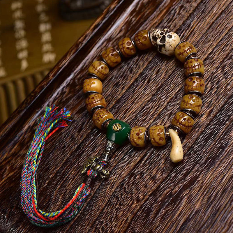 EverestArtstudios Camel Bone Carved Skull Motif Tassel Bracelet