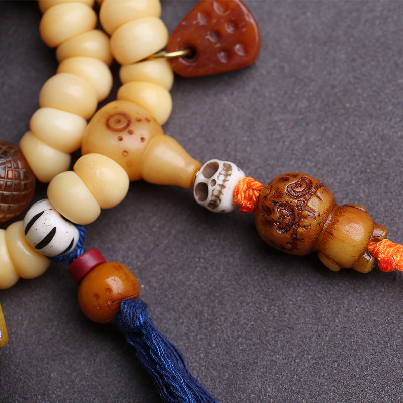 Tibetan return camel bone chicken oil yellow large intestine beads 108 Buddha beads yak bone tee Dumby clip accessories