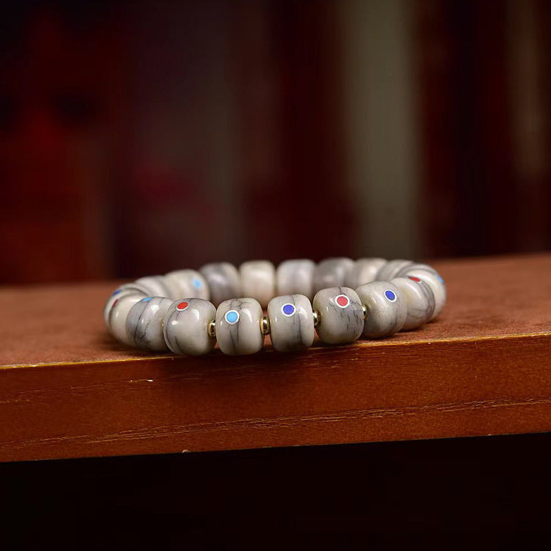 EverestArtstudios Bone Inlaid Barrel Bead Tassel Bracelet