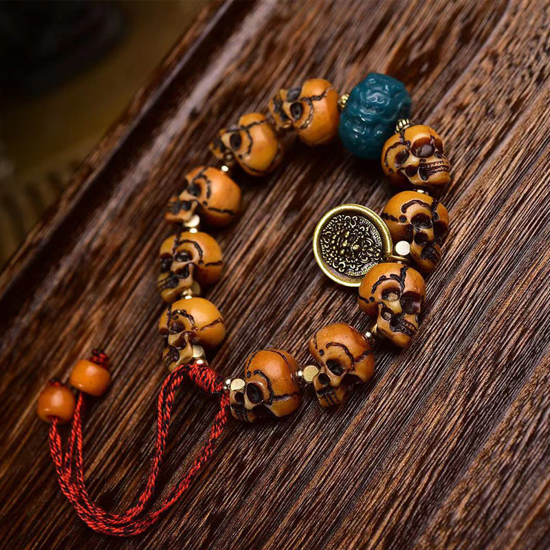 EverestArtstudios Camel Bone Carved Skull Bead Bracelet