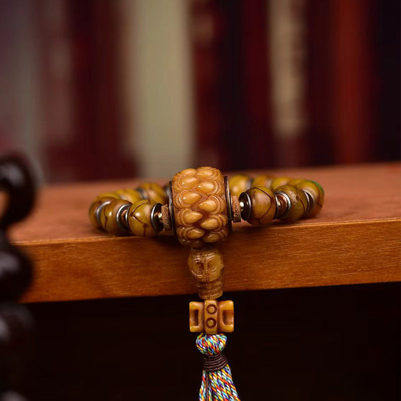 EverestArtstudios Bone Inlaid Barrel Bead Tassel Bracelet