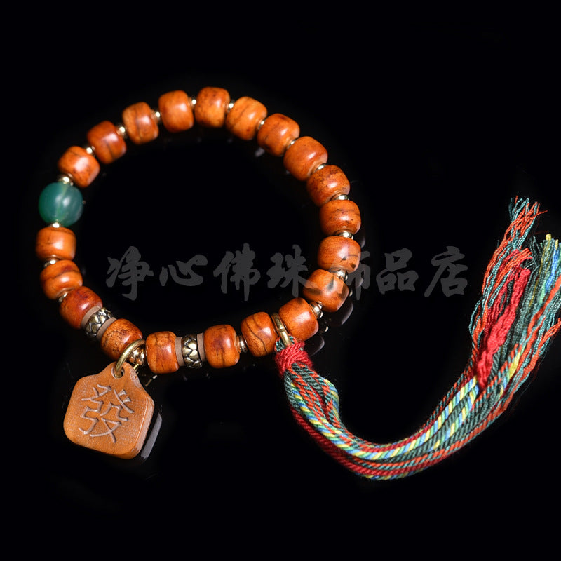 EverestArtstudios Bone Agate Dzi-Style Tassel Bracelet