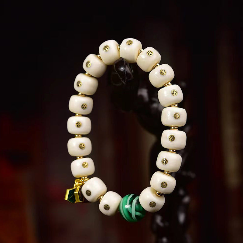 EverestArtstudios Antler Auspicious Symbol Barrel Bead Bracelet