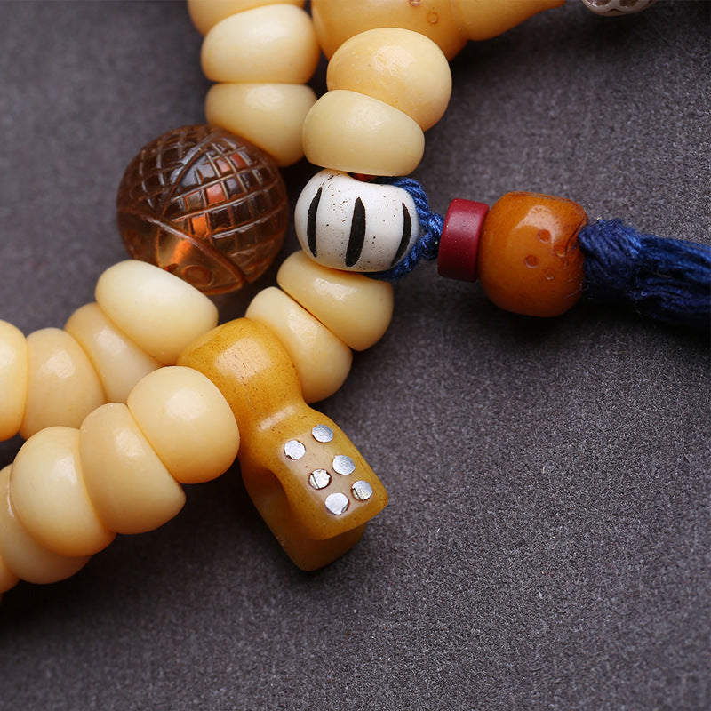 Tibetan return camel bone chicken oil yellow large intestine beads 108 Buddha beads yak bone tee Dumby clip accessories