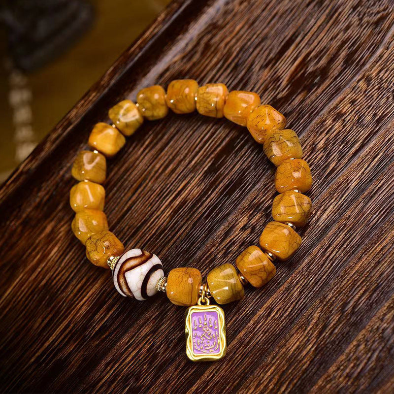 EverestArtstudios Camel Bone Carved Seed-Pattern Tassel Bracelet