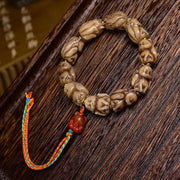 EverestArtstudios Bone Sculpted Fox Bead Tassel Bracelet