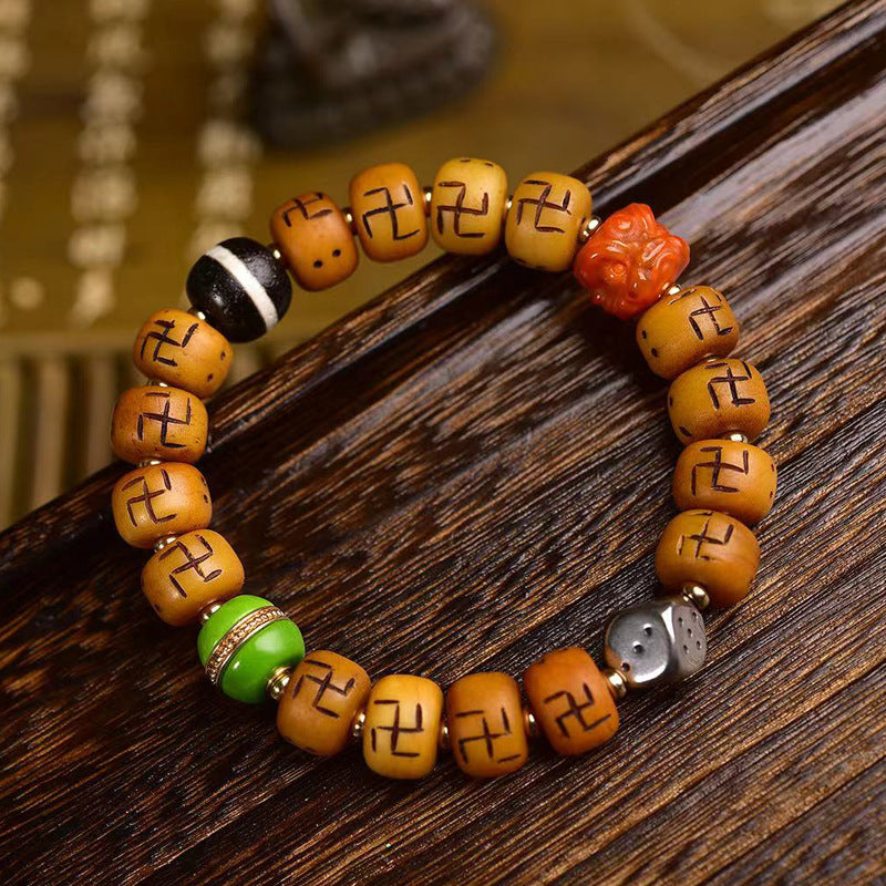 EverestArtstudios Bone Auspicious Symbol Barrel Bead Bracelet