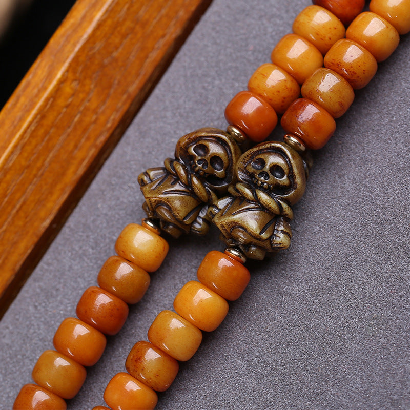 Tibetan return yak bone bucket beads 108 Buddha beads rosary beads engraving yellow God of Wealth pendant camel bone tee accessories