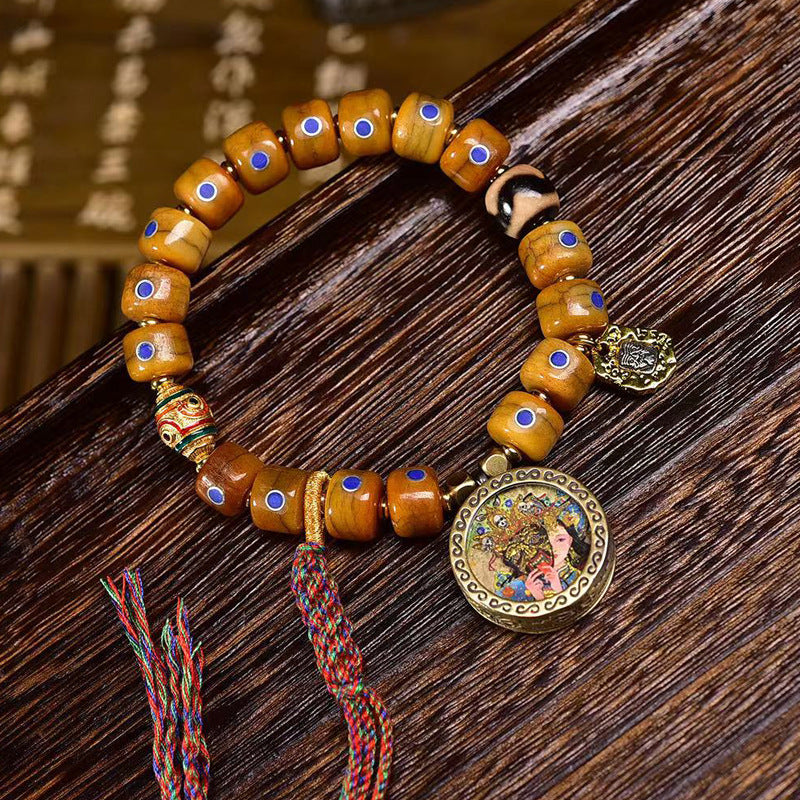 EverestArtstudios Yak Bone Lapis Inlay Thangka Charm Bracelet