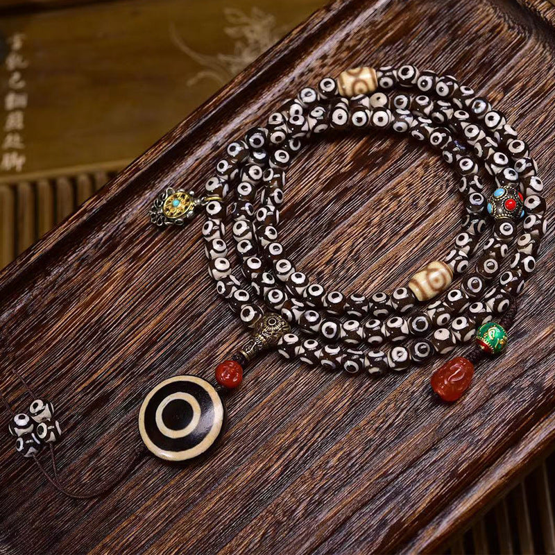 EverestArtstudios Natural Three-Eye Dzi and Red Agate 108-Bead Tibetan Mala