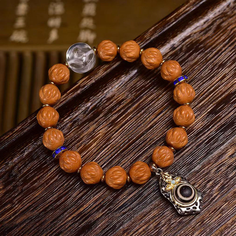 EverestArtstudios Monkey Head Bodhi Seed Carved Crystal Accent Bracelet