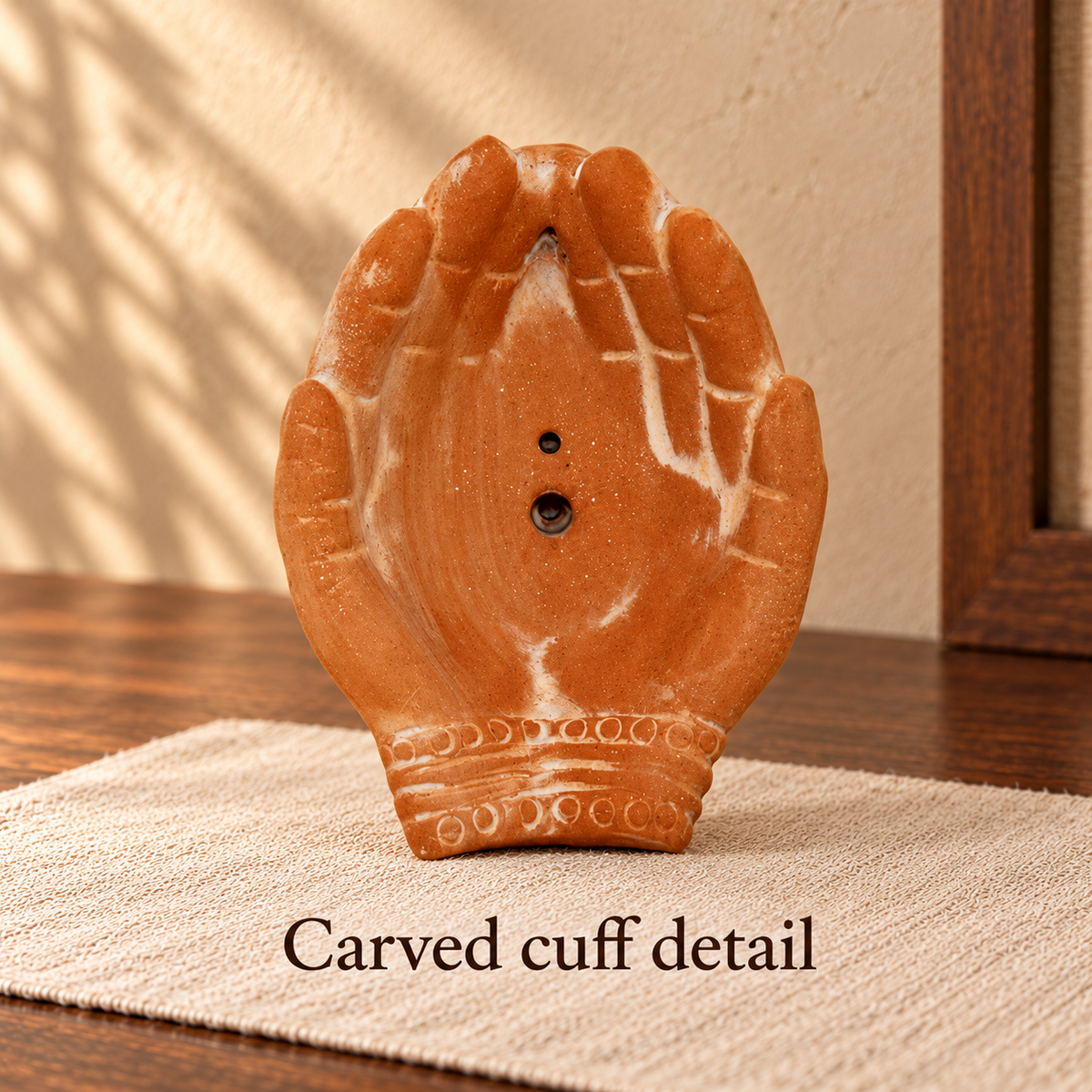 Carved cuff detail