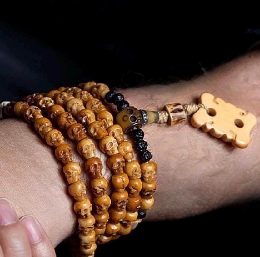 Handcrafted Tibetan Skull Shape Yak Bone Mala Bracelet, 108 Beads Buddhist Prayer Beads for Meditation, Yoga, and Spiritual Healing