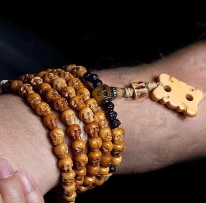 Handcrafted Tibetan Skull Shape Yak Bone Mala Bracelet, 108 Beads Buddhist Prayer Beads for Meditation, Yoga, and Spiritual Healing