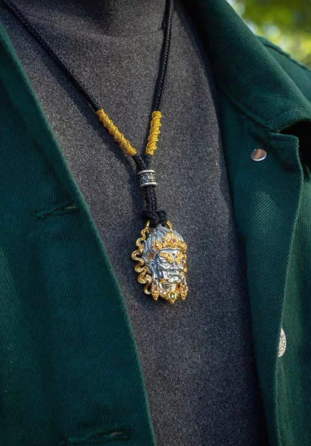 ORNATE MASK PENDANT — original source view 8; ORIGINAL WEARING PHOTOGRAPH