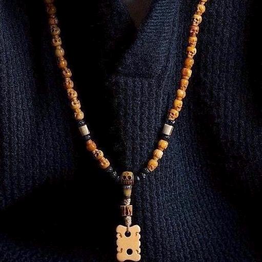 Handcrafted Tibetan Skull Shape Yak Bone Mala Bracelet, 108 Beads Buddhist Prayer Beads for Meditation, Yoga, and Spiritual Healing