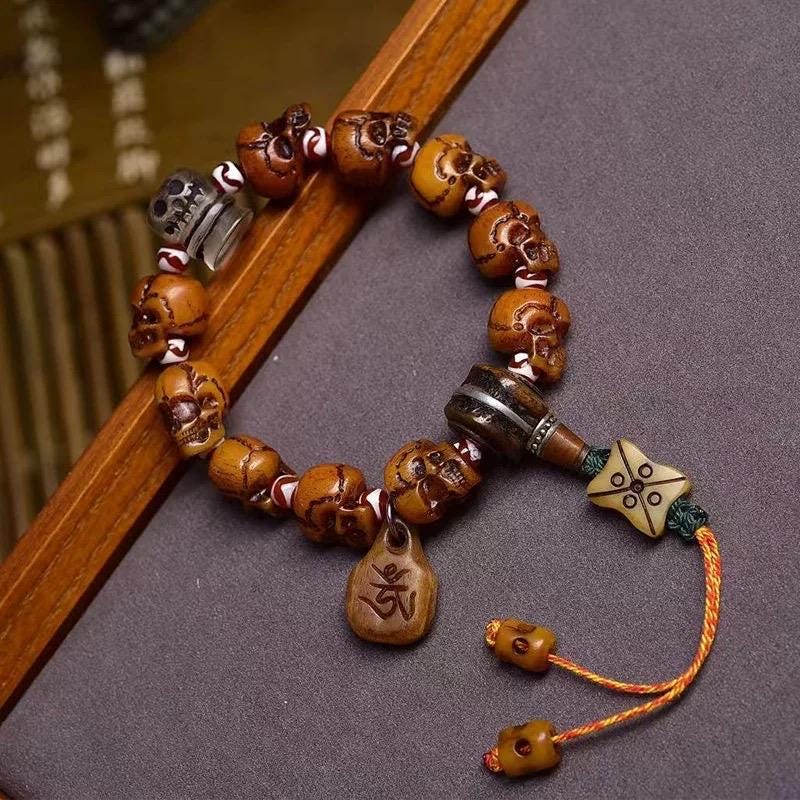 Tibetan Yak Bone Skull Bead Bracelet | Handcrafted Cemetery Mala | Reclaimed Bone Spiritual Jewelry