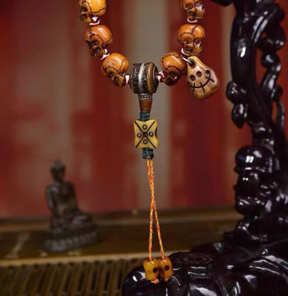Tibetan Yak Bone Skull Bead Bracelet | Handcrafted Cemetery Mala | Reclaimed Bone Spiritual Jewelry