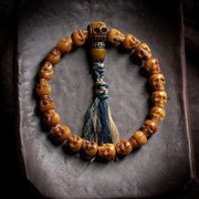 Handcrafted Tibetan Skull Shape Yak Bone Mala Bracelet, 108 Beads Buddhist Prayer Beads for Meditation, Yoga, and Spiritual Healing