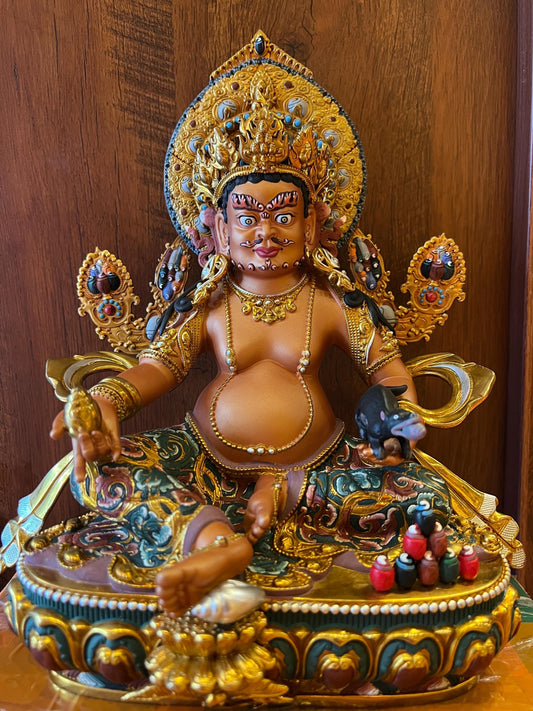 Handcrafted Yellow Dzambhal Brass Statue – Nepalese Style Tibetan Buddhist Deity with Painted Back Panel (9 inch)