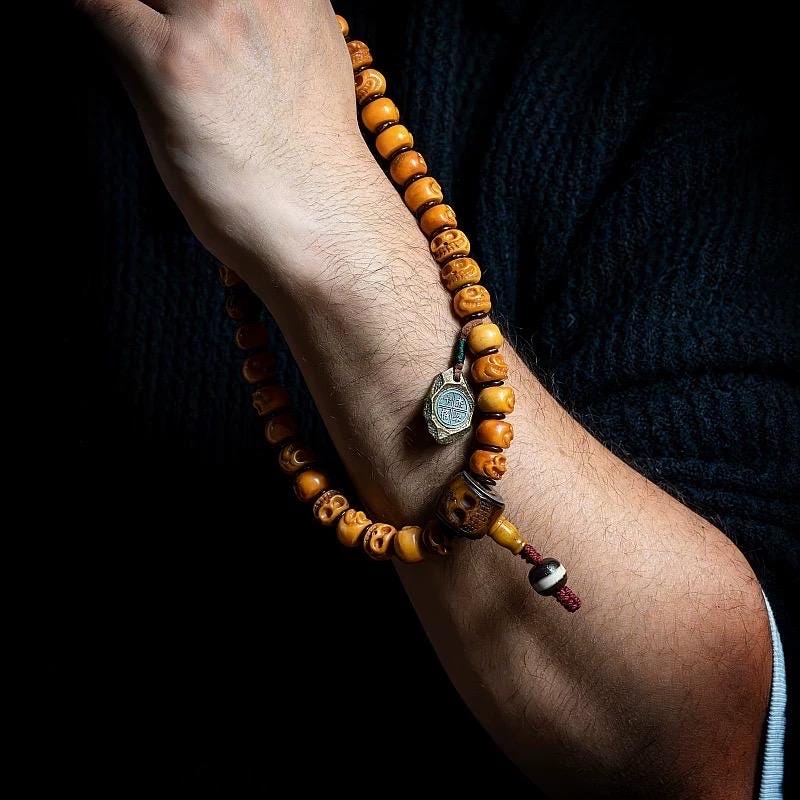 Handcrafted Yak Bone Skull Mala Bracelet: Tibetan Prayer Beads