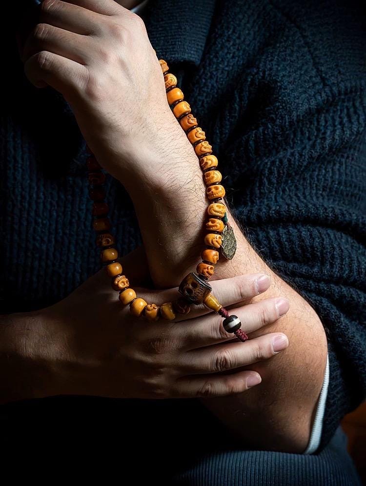 Handcrafted Yak Bone Skull Mala Bracelet: Tibetan Prayer Beads