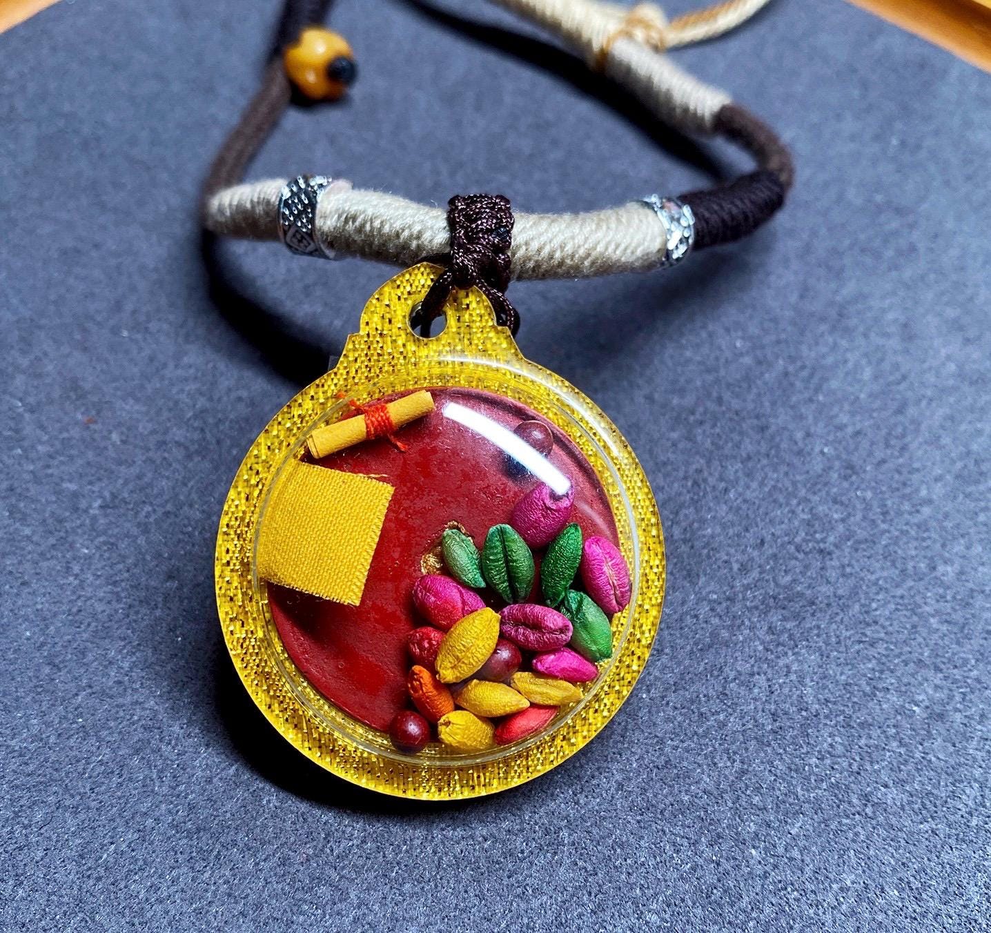 Hand-Painted Black Jambhala Medicine Tsa Tsa Necklace, Tibetan Buddhist Thangka Amulet, Mineral Pigment Folk Art, Spiritual Gift for Wealth