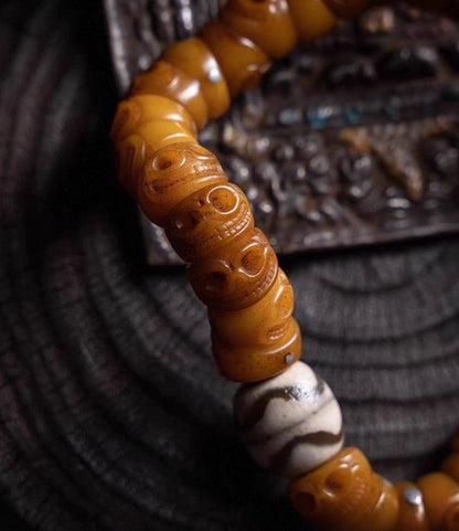 EverestArtStudios Tibetan Yak Bone Bracelet with Tassel, Skull Bone Mala Bracelet, Charnel Ground Inspired Buddhist Wrist Mala