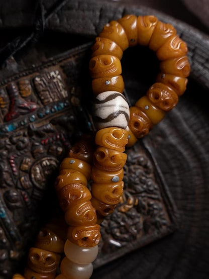EverestArtStudios Tibetan Yak Bone Bracelet with Tassel, Skull Bone Mala Bracelet, Charnel Ground Inspired Buddhist Wrist Mala