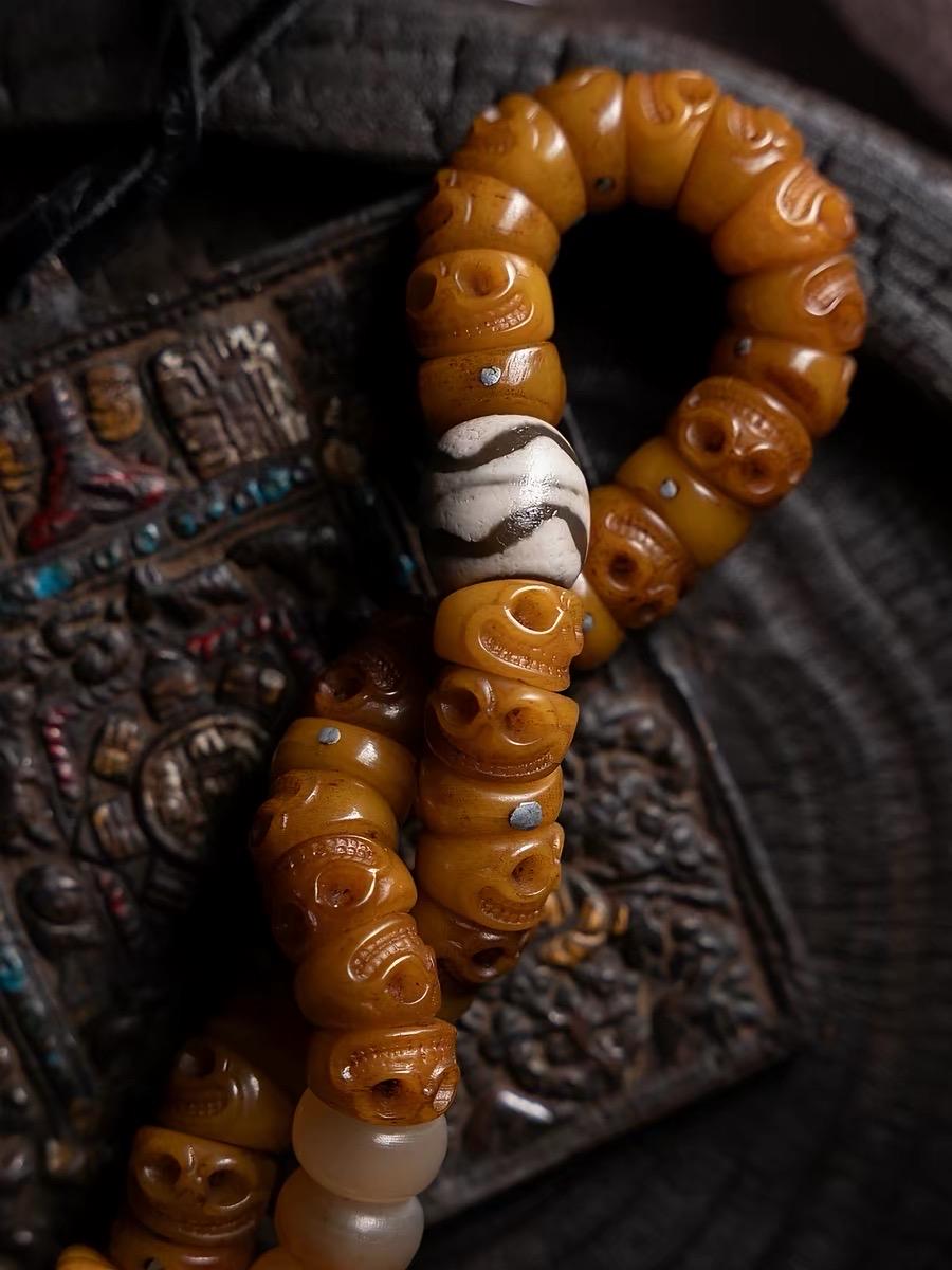 EverestArtStudios Tibetan Yak Bone Bracelet with Tassel, Skull Bone Mala Bracelet, Charnel Ground Inspired Buddhist Wrist Mala