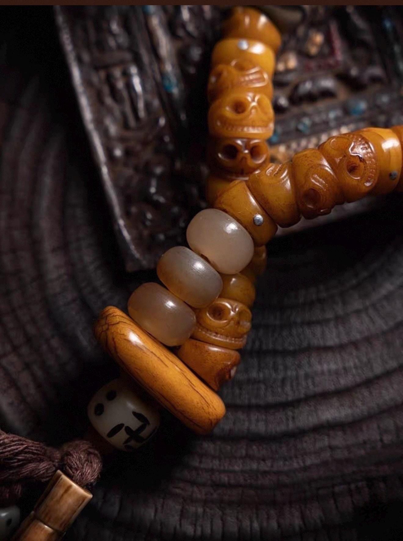 EverestArtStudios Tibetan Yak Bone Bracelet with Tassel, Skull Bone Mala Bracelet, Charnel Ground Inspired Buddhist Wrist Mala
