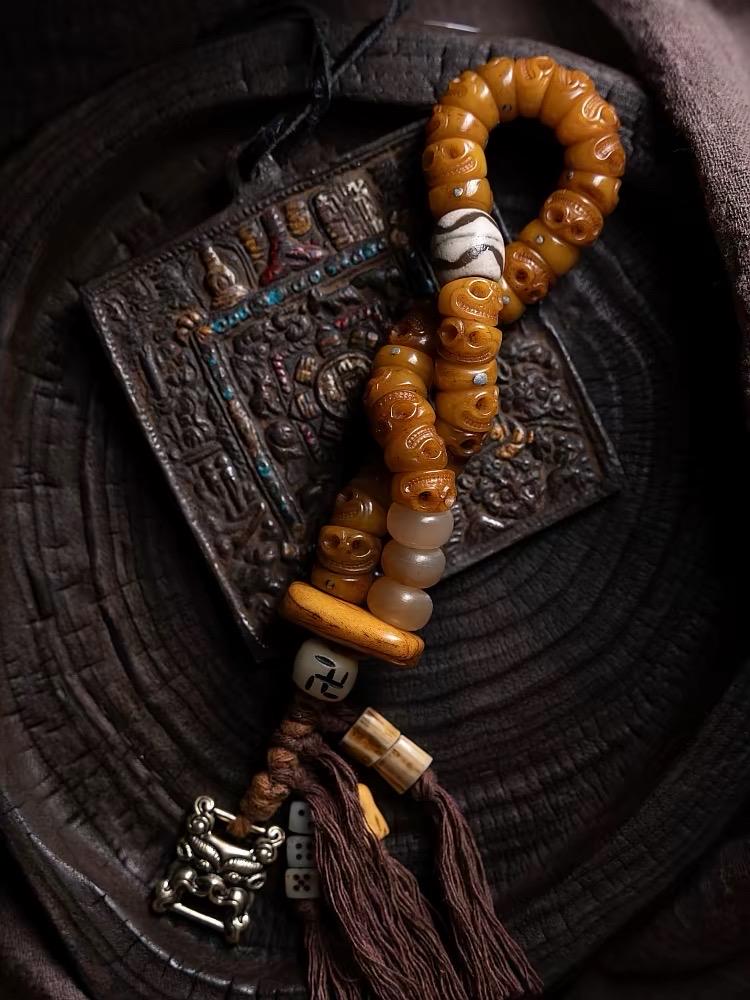 EverestArtStudios Tibetan Yak Bone Bracelet with Tassel, Skull Bone Mala Bracelet, Charnel Ground Inspired Buddhist Wrist Mala