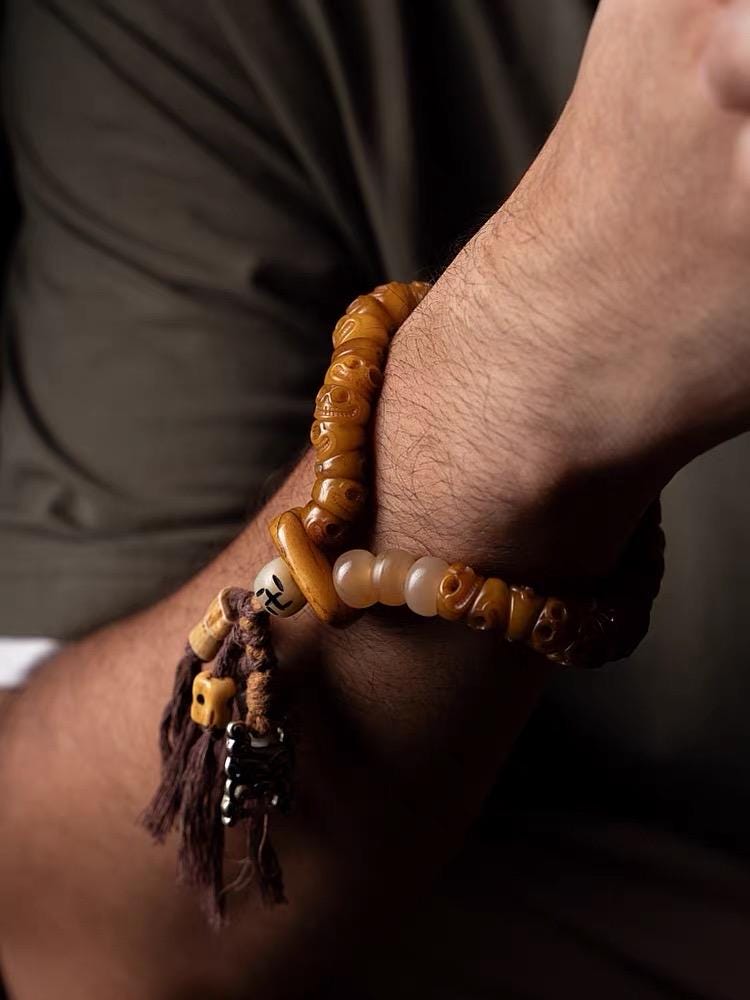 EverestArtStudios Tibetan Yak Bone Bracelet with Tassel, Skull Bone Mala Bracelet, Charnel Ground Inspired Buddhist Wrist Mala