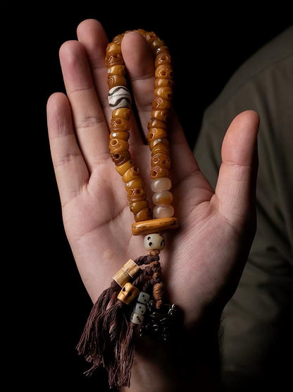 EverestArtStudios Tibetan Yak Bone Bracelet with Tassel, Skull Bone Mala Bracelet, Charnel Ground Inspired Buddhist Wrist Mala