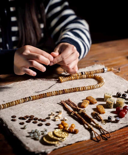EverestArtStudios Tibetan-Style Twisted Goat Horn Mala Bracelet | 108 Beads | Original Design | Handmade Buddhist Prayer Beads