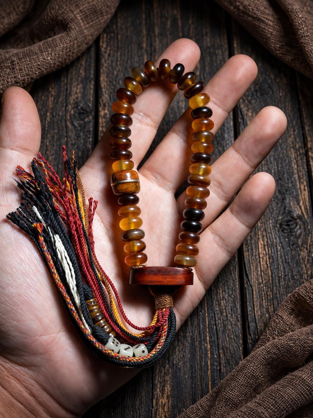EverestArtStudios Amber-Toned Sheep Horn Bracelet, Tibetan Style with Yak Bone and Sandalwood Accents, Tassel or Guru Bead