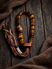 EverestArtStudios Amber-Toned Sheep Horn Bracelet, Tibetan Style with Yak Bone and Sandalwood Accents, Tassel or Guru Bead
