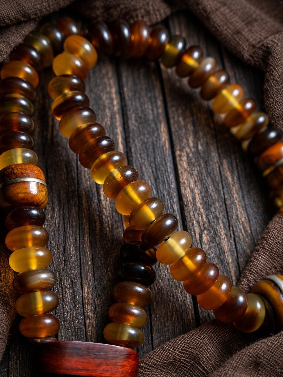 EverestArtStudios Amber-Toned Sheep Horn Bracelet, Tibetan Style with Yak Bone and Sandalwood Accents, Tassel or Guru Bead