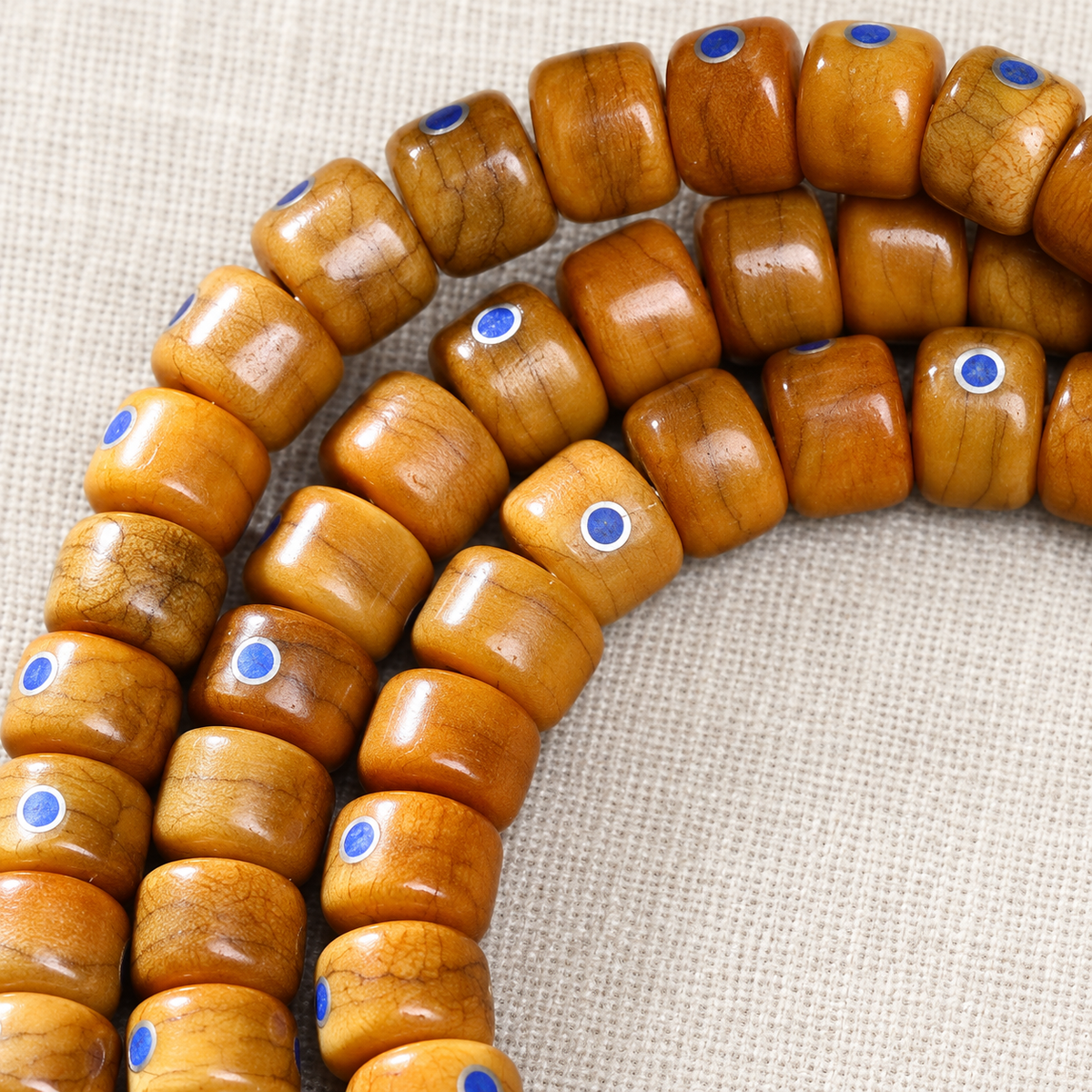 EverestArtstudios Aged Camel Bone and Lapis Inlaid Barrel-Bead 108-Bead DIY Strand — bead detail