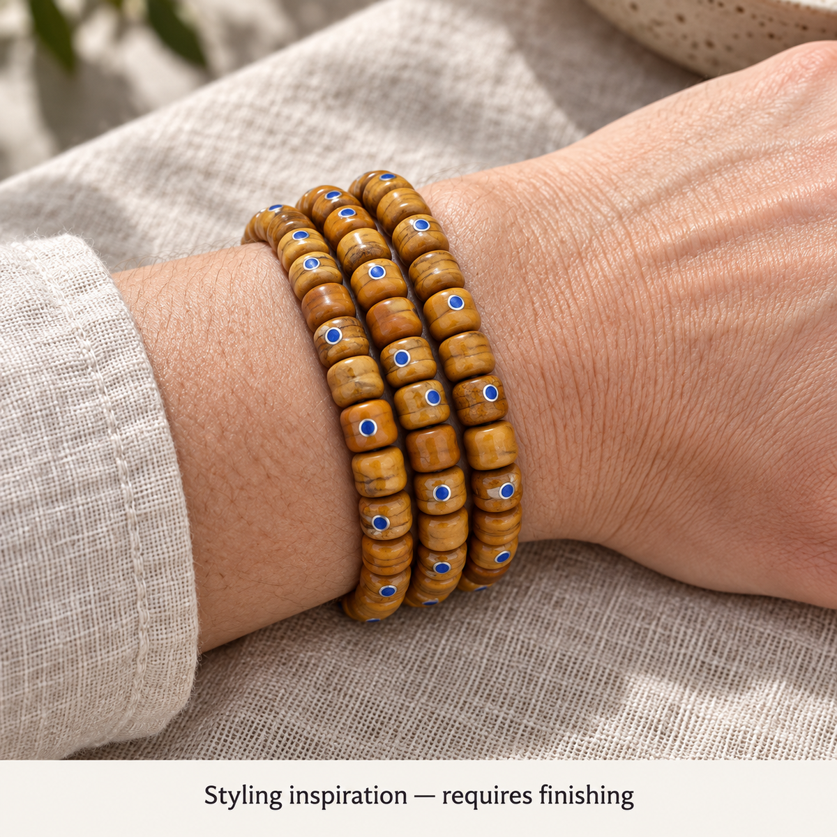 EverestArtstudios Aged Camel Bone and Lapis Inlaid Barrel-Bead 108-Bead DIY Strand — wrist resting