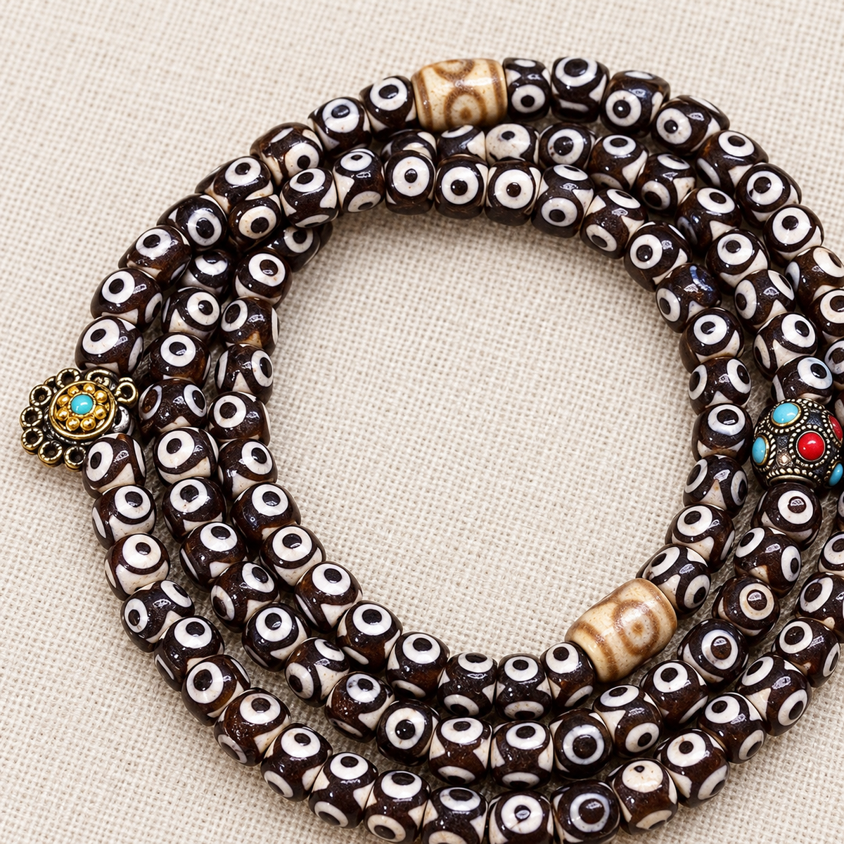 Mala agate rouge 108 perles Dzi trois yeux