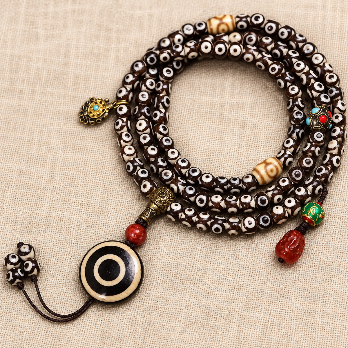 Mala agate rouge 108 perles Dzi trois yeux
