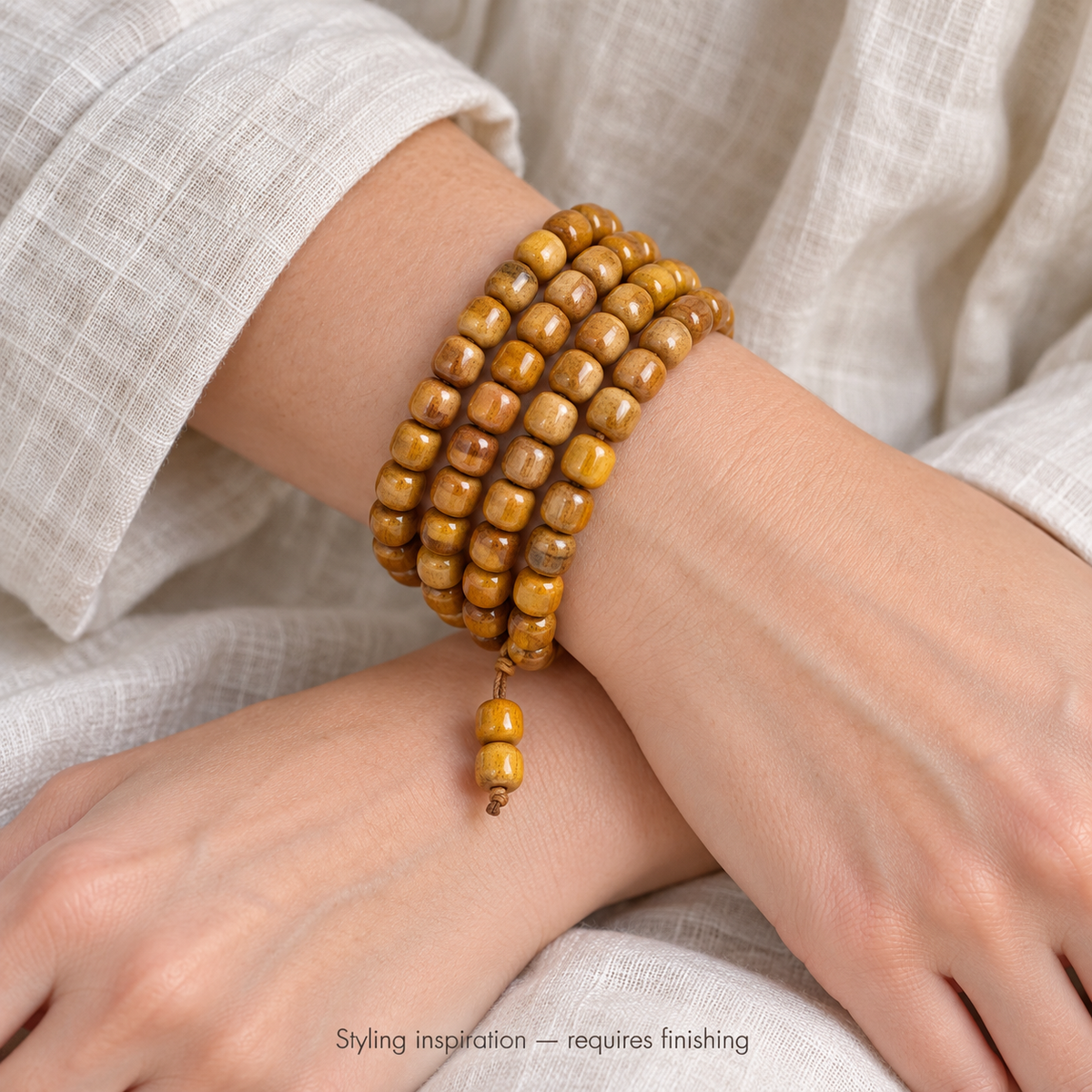 EverestArtstudios Natural Camel Bone and Passion Seed 108-Bead DIY Strand — wrist crossed