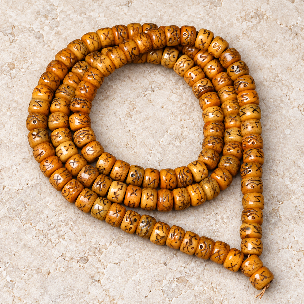 EverestArtstudios Natural Carved Camel Bone 108-Bead DIY Strand with Arhat Accent — overall display