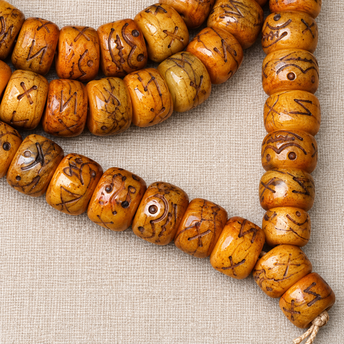 EverestArtstudios Natural Carved Camel Bone 108-Bead DIY Strand with Arhat Accent — cord detail